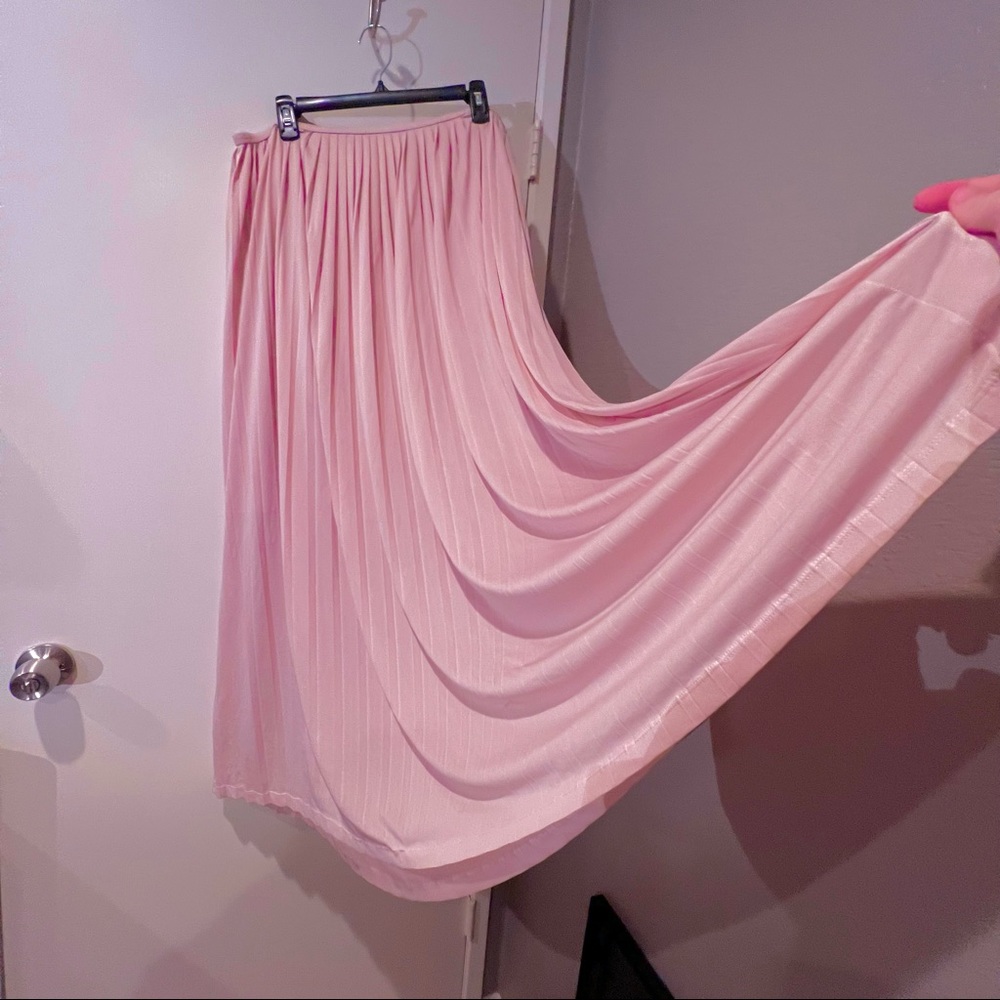 Flow-y, pleated, pale pink skirt, ready for a twirl!